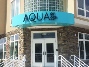 Aqua wall sign
